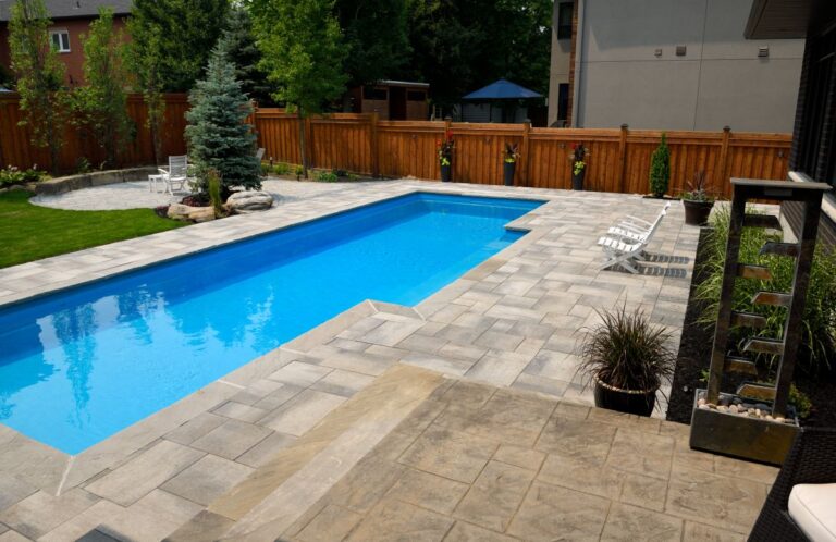 Completed landscaping around new swimming pool