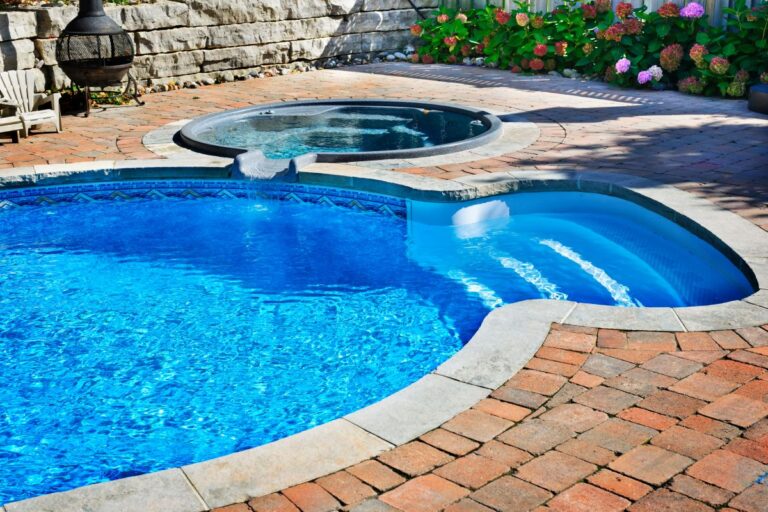 Swimming pool with hot tub