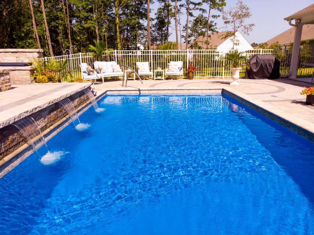 dark blue pool with cascades left side
